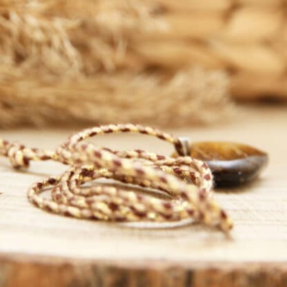 Bijou en œil de tigre – protection et confiance en soi pour femme et enfant.