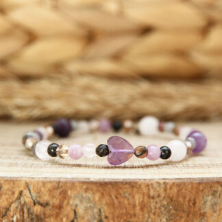 Bracelet femme “dépendance affective” en quartz rose et cœur d’améthyste, perles 4–6 mm, fait main sur-mesure.