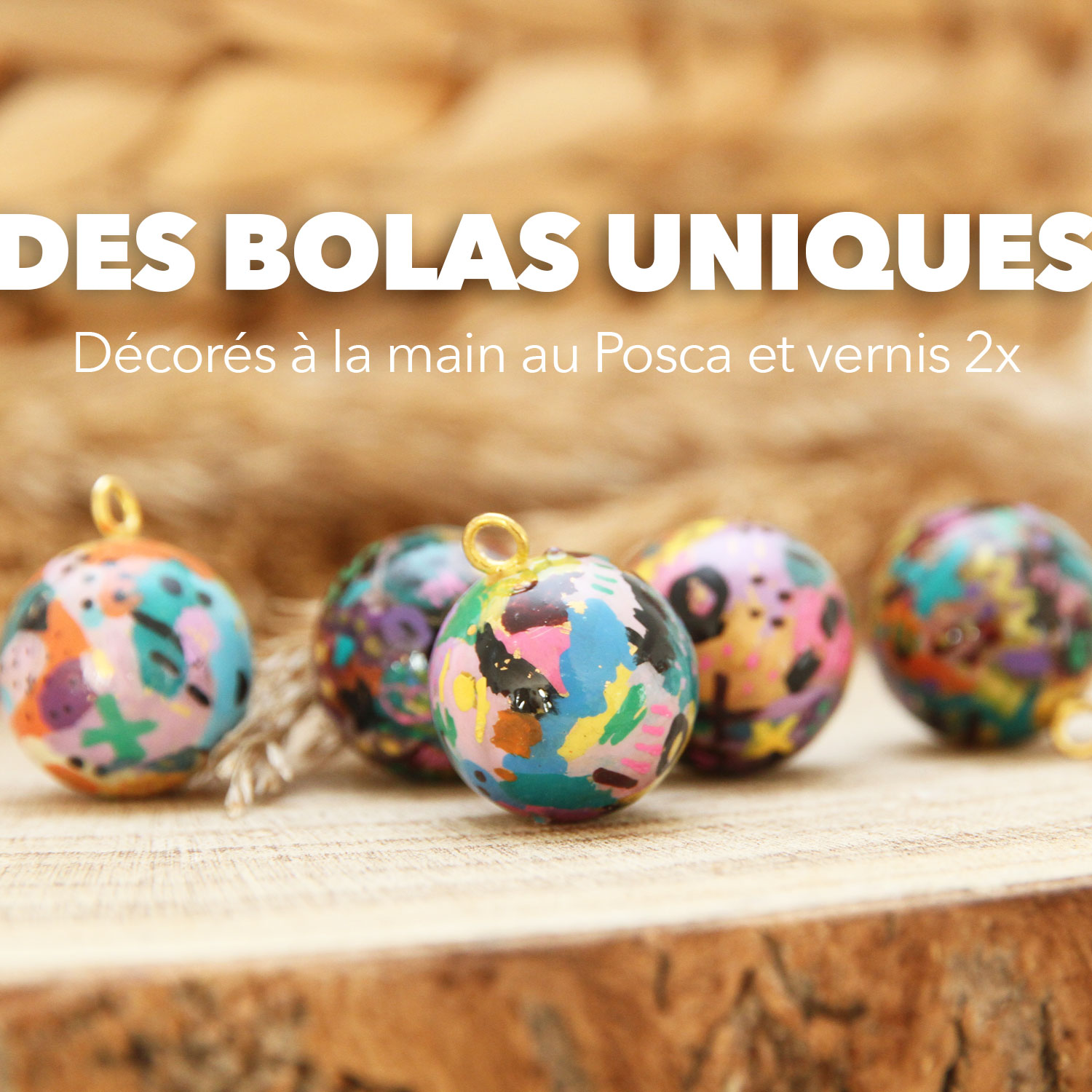 Vue rapprochée du pendentif graffiti, décoré en plusieurs couches posca.